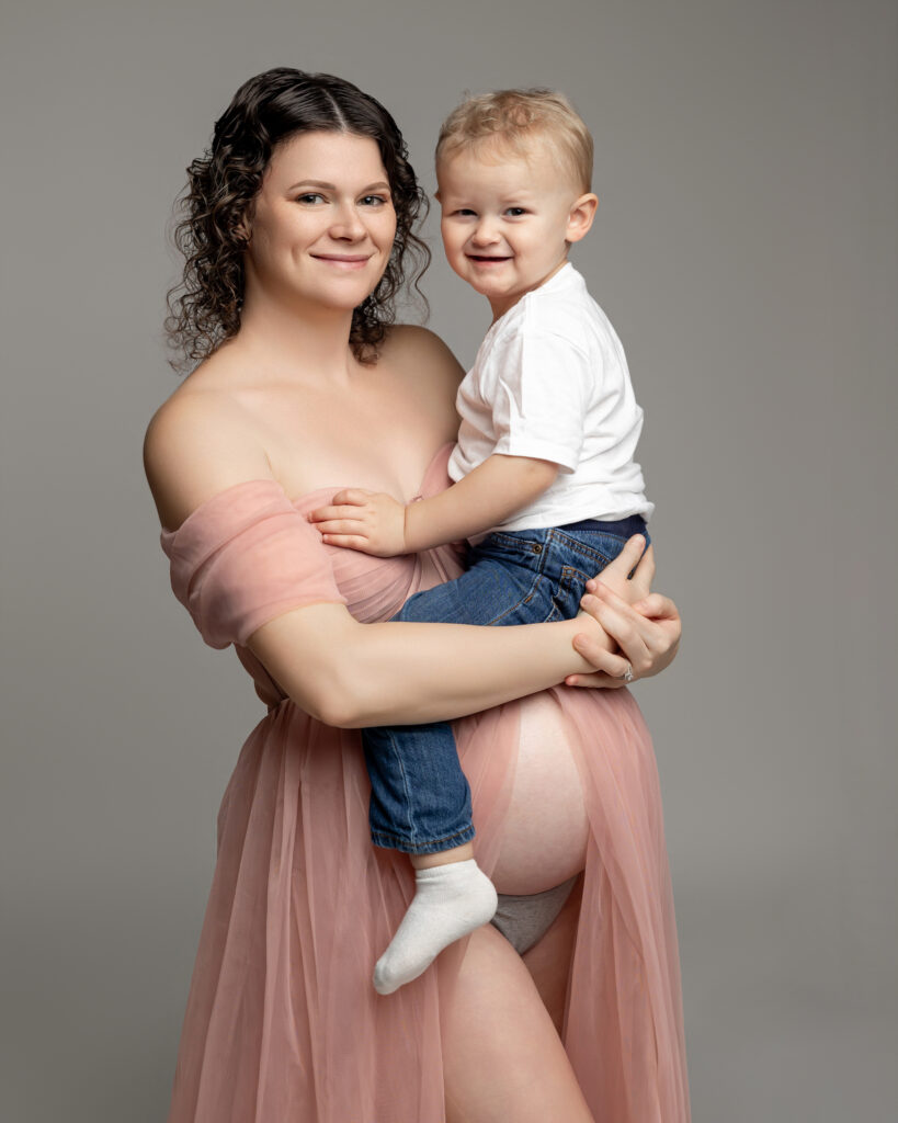 Maternity portrait highlighting the connection between mother and baby
